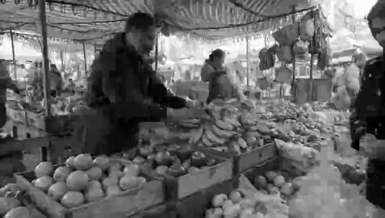 Grayscale, blocky market, A generated market clip, grayscale and at 120 kbps